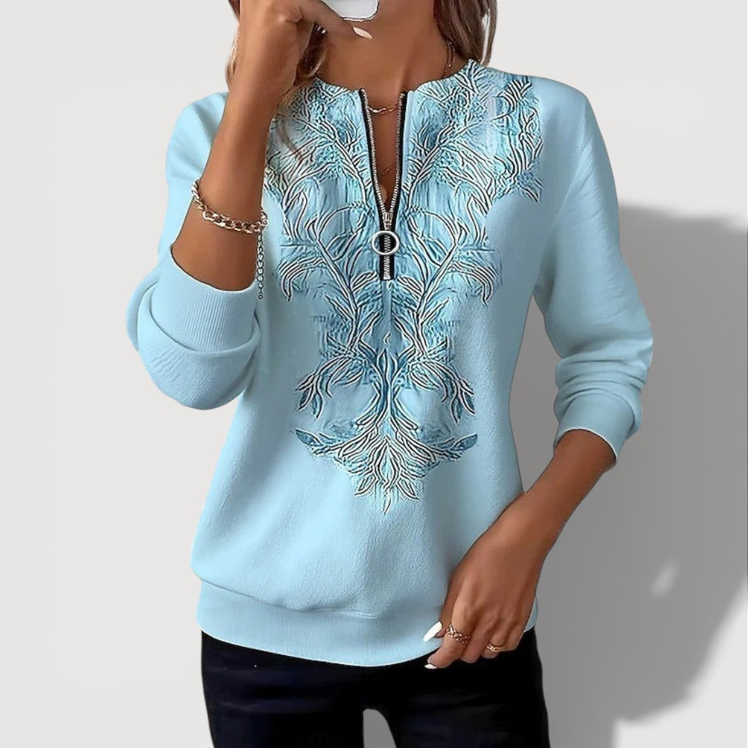 GENIEVA – EMBROIDERED ZIP TOP