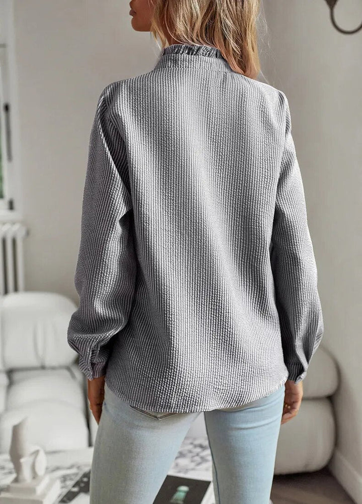 CLARA – RUFFLE TRIM BLOUSE